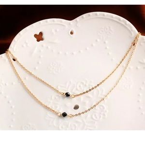 TWO LAYER GOLD TONE NECKLACE with BLACK BEADS